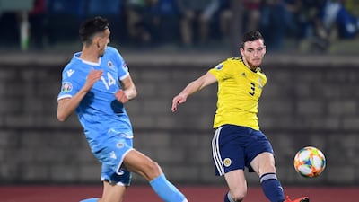 Liverpool's Andrew Robertson in action for Scotland against San Marino. He missed the trip to Kazakhstan due to a dental issue. Reuters