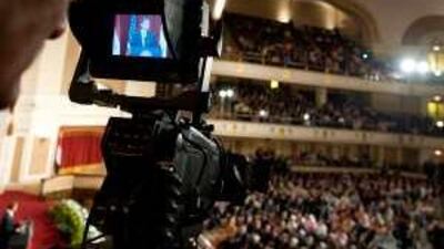 A cameraman films as the US president Barack Obama delivers his highly-anticipated address to the Muslim world.