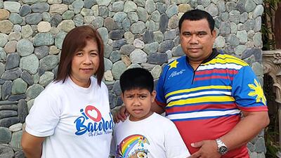 Albert Sabado with wife Mary Joy and their son, Alvin. Picture supplied by family
