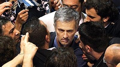 Jose Mourinho is surrounded by Inter fans before his team's Champions League victory over Barcelona on Wednesday.