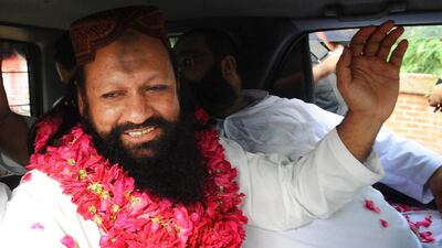 Malik Ishaq, leader of the banned organisation Lashkar-e-Jhangvi, pictured in Lahore in 2011. Ishaq and at least 13 other militants including two of his sons were killed in an encounter in Muzzaffargarh district, police say. Rahat Dar / EPA