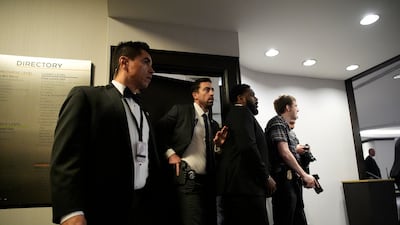 Security personnel stand on alert after hearing shots fired at the White House Correspondents' Association Dinner where US President Donald Trump and First Lady Melania Trump is attending in Washington, DC, USA, 25 April 2026. Attendees, including US President Donald Trump, were evacuated at the White House Correspondents’ Dinner after shots were fired at the venue. EPA / Yuri Gripas / POOL