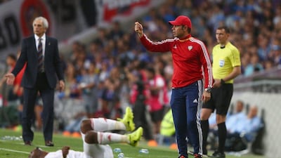 UAE mananger Mahdi Ali looks on from the touchline during his side's 2-0 defeat to Japan on Thursday, Francois Nel / Getty Images