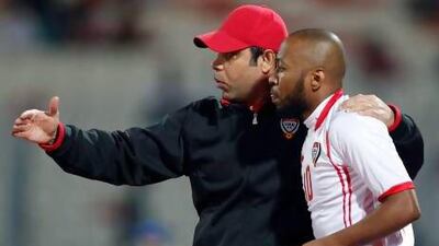 Mahdi Ali, UAE's head coach, left, is planning to make changes to his team for tomorrow's match against Oman. Fadi Al-Assaad / Reuters