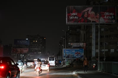Authorities in Egypt have dimmed street lights and outdoor advertising in response to the energy crisis. EPA