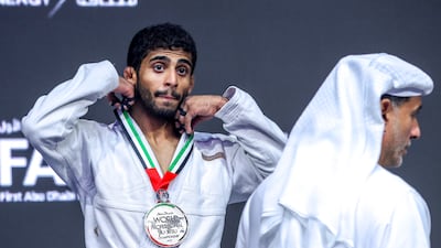 UAE's Zayed Al Katheeri with the 56kg silver medal at the 15th Abu Dhabi World Professional Jiu-Jitsu Championship. All photos Victor Besa / The National