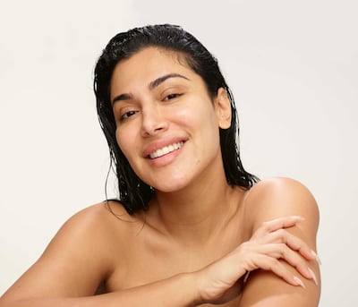Huda Kattan posed barefaced for the Wishful campaign. Courtesy Huda Beauty