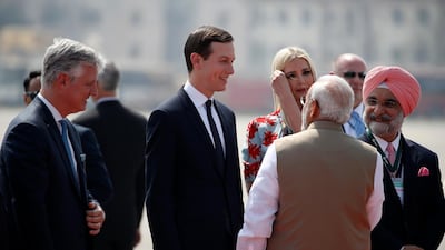 White House Senior Adviser Jared Kushner and his wife Ivanka Trump speak with Indian Prime Minister Narendra Modi, back to camera, as they wait for the arrival of U.S. President Donald Trump and first lady Melania Trump at Sardar Vallabhbhai Patel International Airport in Ahmedabad. AP Photo