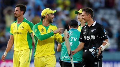 Trent Boult, right, talks to Glenn Maxwell after Australia's Cricket World Cup win over New Zealand. Reuters