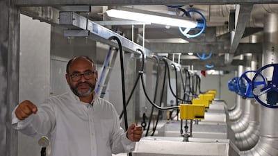 Saud Abdulaziz Abdul Ghani gives a tour of the cooling system at the Al Janoub Stadium in Doha.