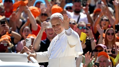 A smiling Pope Leo XIV arrives in the sunshine to lead the weekly general audience in St Peter’s Square, Vatican City. EPA