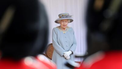 The smaller ceremony took place instead of Trooping the Colour, which traditionally is held at Buckingham Palace to mark the Queen's official birthday. AFP