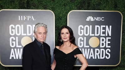Michael Douglas and Catherine Zeta-Jones, in Dolce & Gabbana, attend the 78th annual Golden Globe Awards in New York, US, on February 28, 2021. AFP
