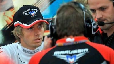 Charles Pic, left, has risen quickly through the ranks but his future with the Marussia team is still uncertain. Jung Yeon-Je / AFP
