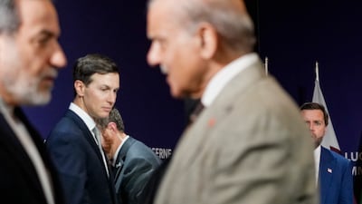 US Vice President JD Vance, right, looks on next to Jared Kushner, as Iran's Foreign Minister, Abbas Araqchi, (left) shakes hands with Pakistani Prime Minister Shehbaz Sharif at the Lake Lucerne Summit. Getty Images