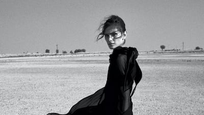 Sands of time: Dress, price on request, Lanvin. Boots, Dh6,500, Versace. Socks, Dh450, Bottega Veneta