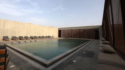 The pool was designed to 'connect with the landscape'. Satish Kumar / The National
