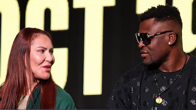 Francis Ngannou and Cris Cyborg chat. Chris Whiteoak / The National
