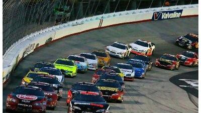 Unlike Formula One, Nascar celebrates more adventurous side-by-side racing that very often leads to photo finishes. Jason Smith / Getty Images