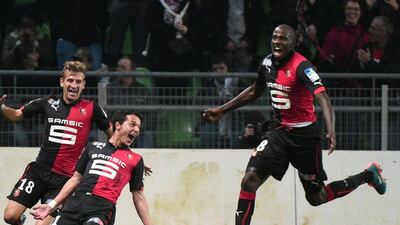 Rennes' Philipp Hosiner celebrates with teammates after scoring during the Coupe de la Ligue against Marseille on Wednesday night. Damien Meyer / AFP / October 29, 2014