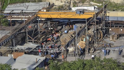 People gather at a mine in the Soma district in the western Turkish province of Manisa where an explosion left hundred of miners trapped on May 13, 2014. Ihlas News Agency / AFP