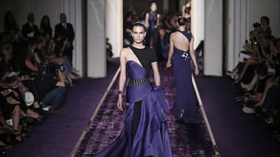 A model presents a creation from the Haute Couture Fall-Winter 2014/15 collection by Italian designer Donatella Versace for Versace fashion house during the Paris Fashion Week, in Paris, France, 06 July 2014. The presentation of the Women’s Haute Couture collections runs from 06 to 10 July. EPA