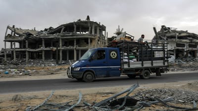 Internally displaced Palestinians leave with their belongings following an evacuation order issued by the Israeli army, in Rafah, southern Gaza Strip, on Saturday, May 11. EPA