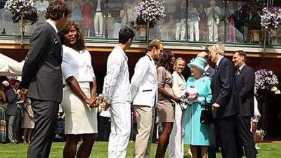 Britain's Queen Elizabeth II meets, from left, Roger Federer, Serena Williams, Novak Djokovic, Andy Roddick, Venus Williams and Caroline Wozniacki as she attends the Wimbledon .for the first time in 33 years.