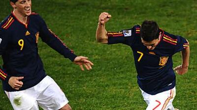Spain strikers Fernando Torres, left, and David Villa have had opposite results since arriving in South Africa.