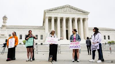 Protesters demonstrate outside the US Supreme Court in Washington. Bloomberg