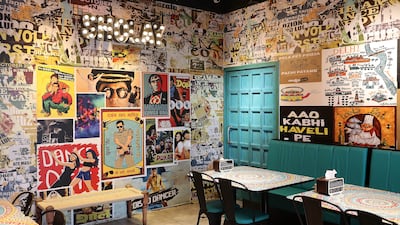 Emirati-run Bollywood-themed Ali Bhai Restaurant in Dubai is full of movie posters. All photos: Pawan Singh / The National