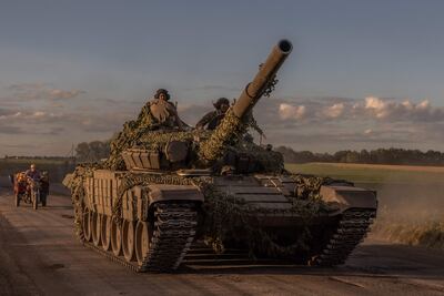 Ukrainian servicemen operate a Soviet-made T-72 tank in the Sumy region, near the border with Russia, last month. AFP