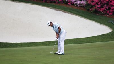 Hideki Matsuyama of Japan putts on the thirteenth hole. EPA
