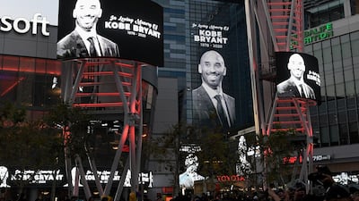 Electronic signs honor Kobe Bryant at L.A. Live in Los Angeles following reports of his death in a helicopter crash in southern California. AP Photo