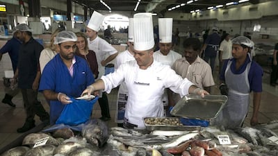 Pascal Sfara, Chef De Cuisine at Amalfi restaurant at the Le Royal Meridien hotel, picks out the freshest seafood at the fish market in Mina Zayed. Silvia Razgova / The National