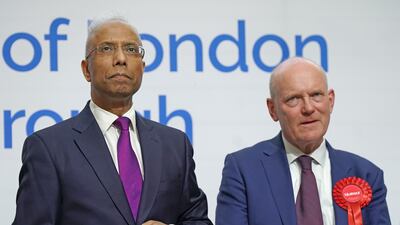 Lutfur Rahman, left, has been elected mayor of Tower Hamlets in London after defeating incumbent John Biggs, right. PA