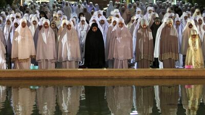 Thai Muslim women pray in a mosque in the southern province of Pattani, Thailand, during the holy month of Ramadan, June 19, 2015. Surapan Boonthanom / Reuters