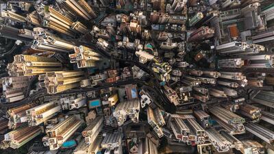 This aerial photo shows commercial and residential buildings in Hong Kong. AFP