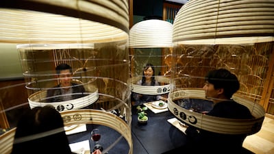 Hoshinoya Tokyo Hotel staff demonstrate a 'Lantern Dining Experience' for people who wish to dine out safely during the latest wave of the coronavirus pandemic to hit Japan's capital, Tokyo, Japan. Reuters