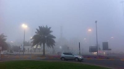 Abu Dhabi was also hit by the fog as drivers on 15th Street make their way through the mist. Scott Armstrong