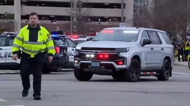Police at the site where a gunman opened fire at Old Dominion University in Norfolk, Virginia, on March 12. ABC Affiliate WVEC via Reuters