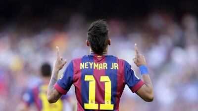 Barcelona’s Neymar celebrates after scoring against Real Sociedad during a Spanish La Liga soccer match at the Camp Nou stadium in Barcelona, Spain, Saturday, May 9, 2015. (AP Photo/Manu Fernandez)