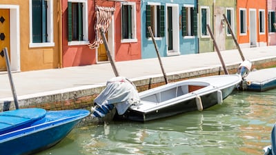 Burano attracts day-trippers thanks to its tiny waterways lined with multicoloured houses. Photo: Mattia Mionetto