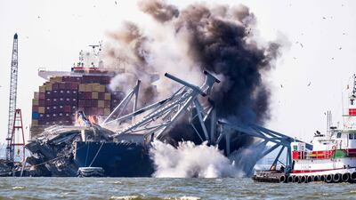 The controlled demolition of a section of the Francis Scott Key Bridge, which fell on the Dali container ship, in Baltimore. The bridge collapsed on March 26 after the ship lost power and collided into a support column, killing six road construction workers. AFP