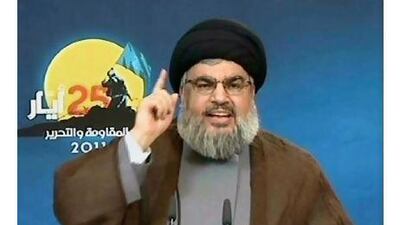 Hassan Nasrallah, the head of Hizbollah, delivers a speech via closed-circuit video from an undisclosed location yesterday to mark the 11th anniversary of the withdrawal of Israeli troops from Lebanese territory after 22 years of occupation, which the group observes as Liberation Day. AFP