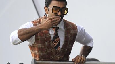 Indian Bollywood actor Ranveer Singh poses as he watches play during the 2019 Cricket World Cup group stage match between India and Pakistan at Old Trafford. AFP
