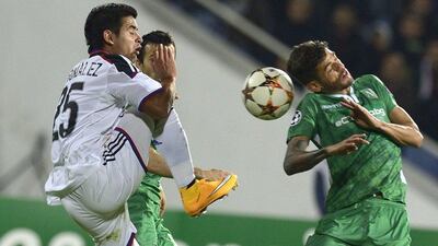 Junior Caicara, right, of Ludogorets Razrad vies for the ball with Derlis Gonzalez of FC Basel during their Champions League match on Wednesday in Sofia, Bulgaria. Vassil Donev / EPA