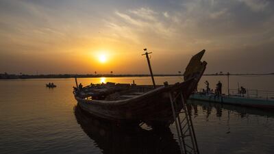 Iraqis fish at Shatt al-Arab river, formed by the confluence of the Euphrates and the Tigris, in the Basra Governorate of southern Iraq. AFP