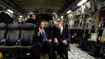 With Tom Sullivan, US deputy chief of staff for policy, as they depart Tel Aviv, en route to Jordan. AP