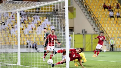 UAE's Fabio De Lima scores the first of his two headed goals. Chris Whiteoak / The National.